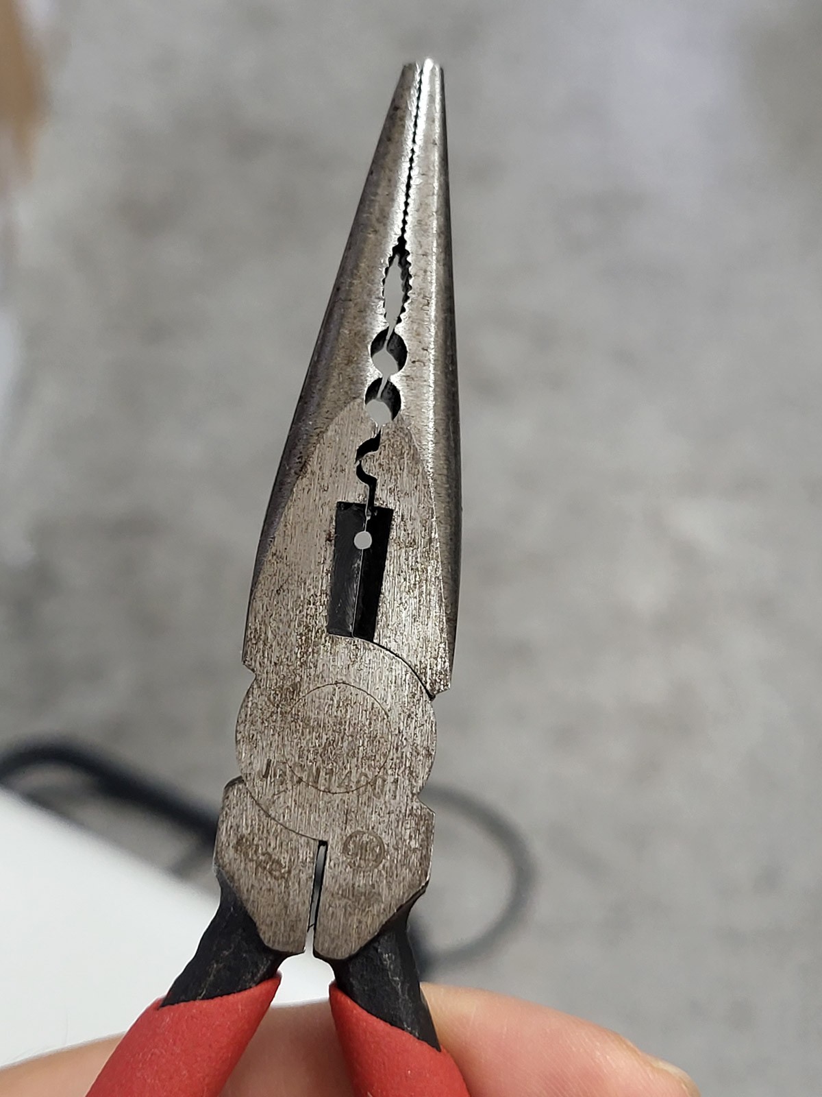 Long-nose pliers.